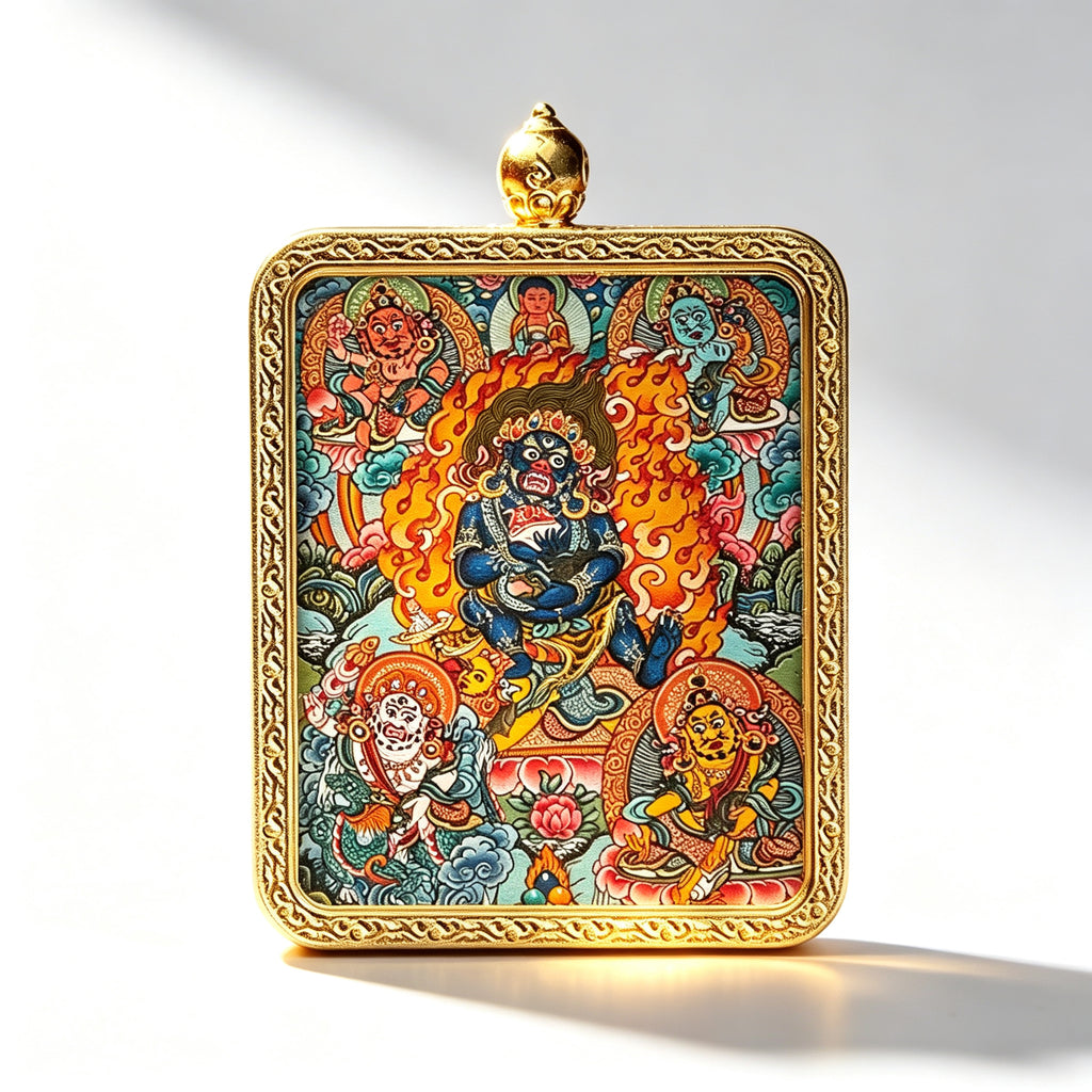 Hand-painted Mahakala miniature thangka pendant in a gold frame, studio shot